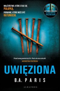 Okładka: UWIĘZIONA