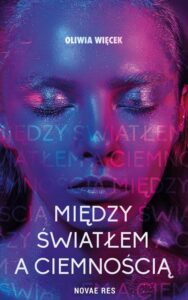 Okładka: Między światłem a ciemnością