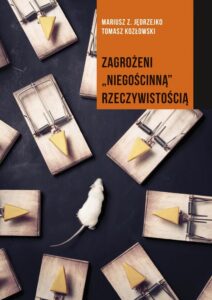 Okładka: Zagrożeni niegościnną rzeczywistością